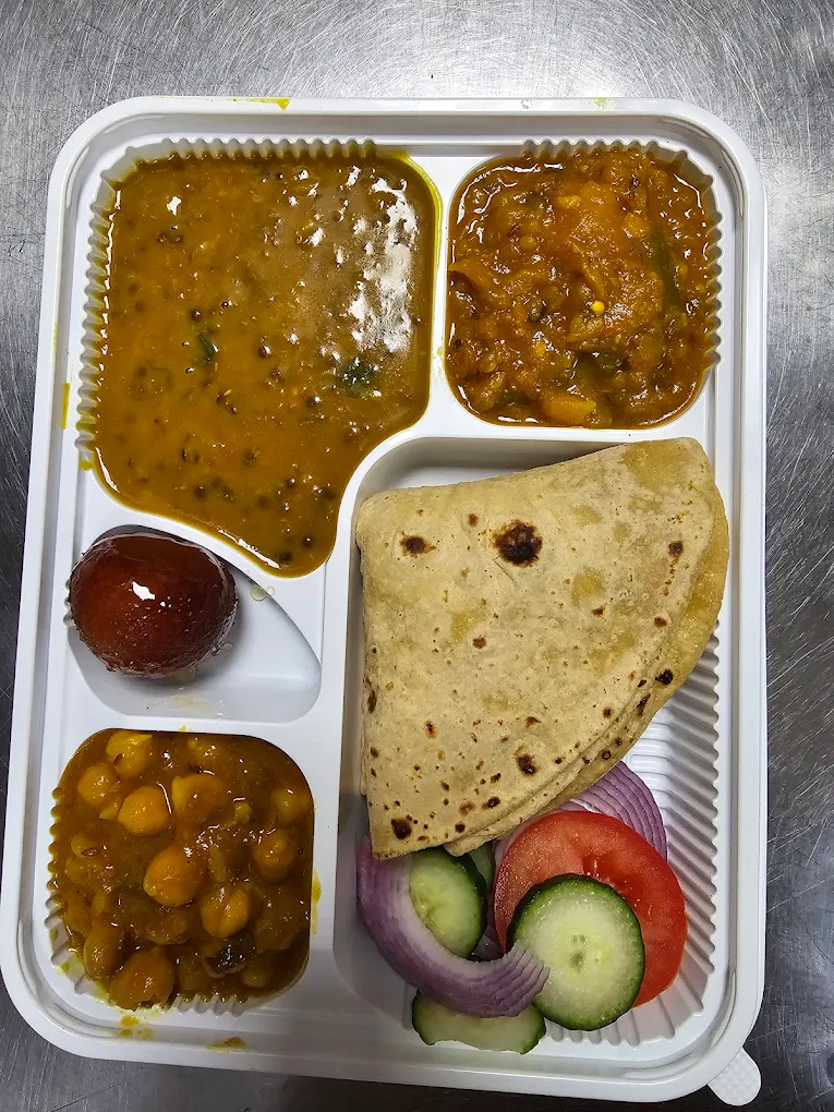 Aloo Parantha with yogurt at Uncle's Tiffin & Pizza Edmonton, AB